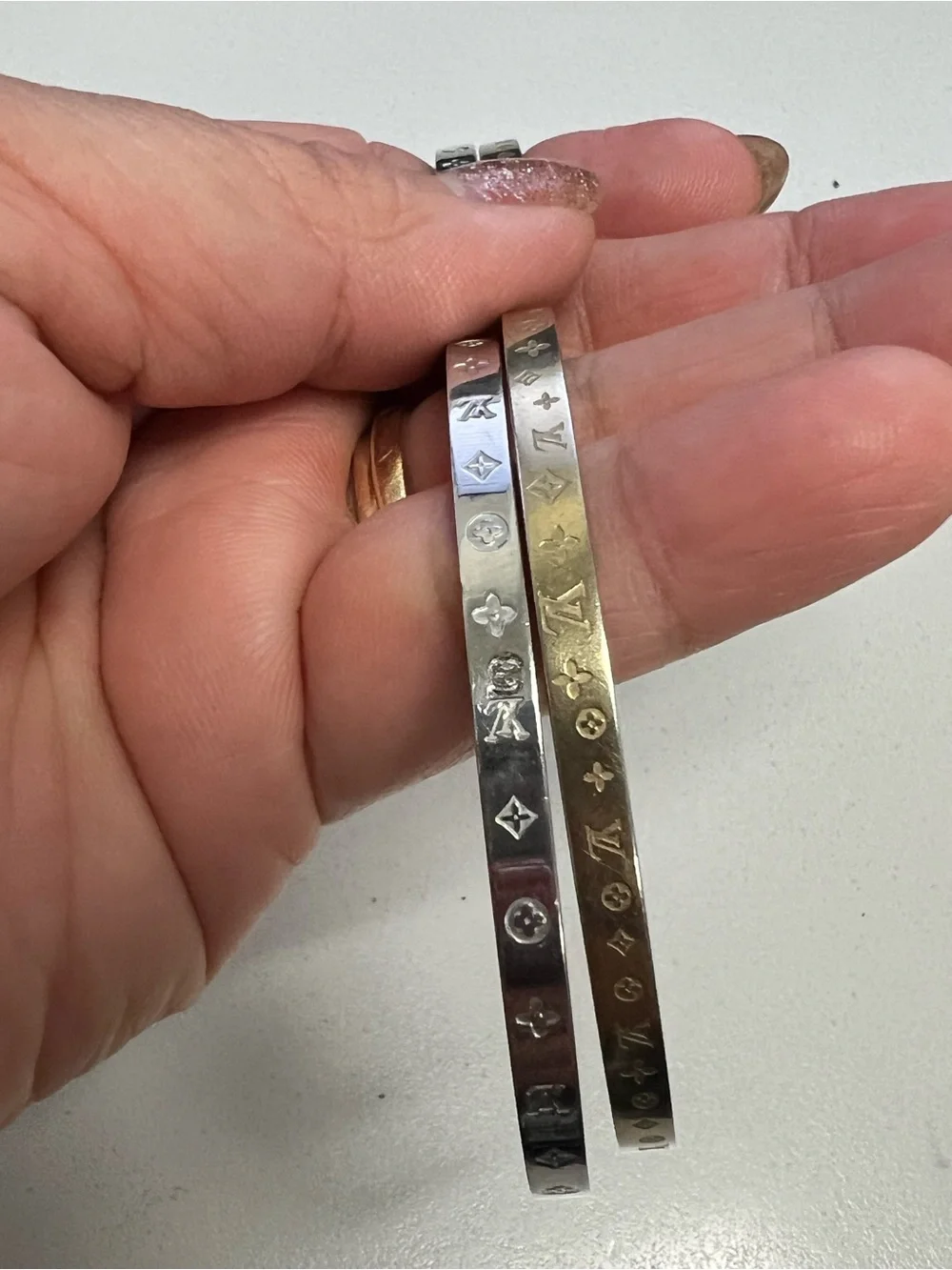 Chanel, LV, Gucci Stackable Silver and Gold Logo Bangle Set - Picture 7 of 16